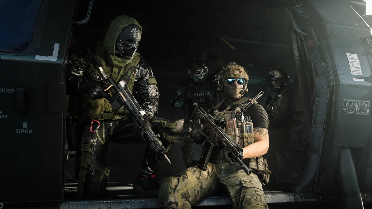 Armed Call of Duty operators stand together in the dark doorway of an aircraft.
