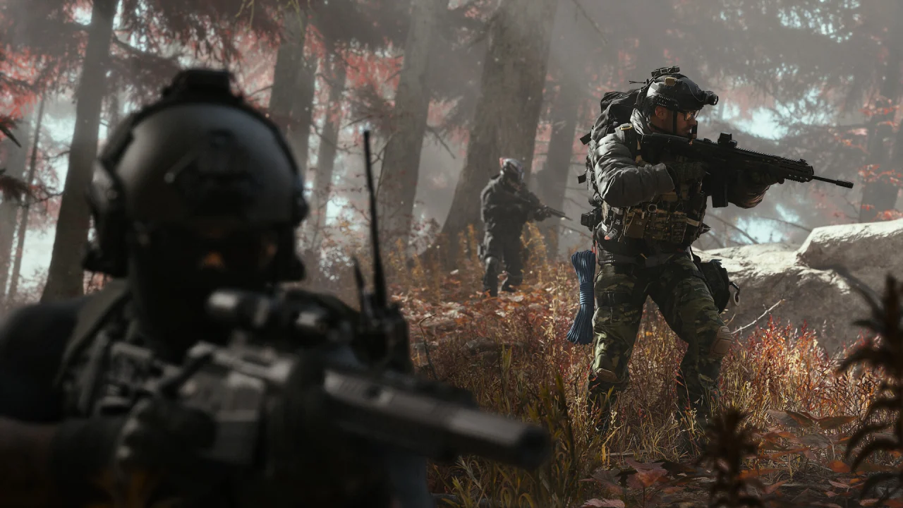 A squad of Call of Duty soldiers advances through a forest with rifles raised.