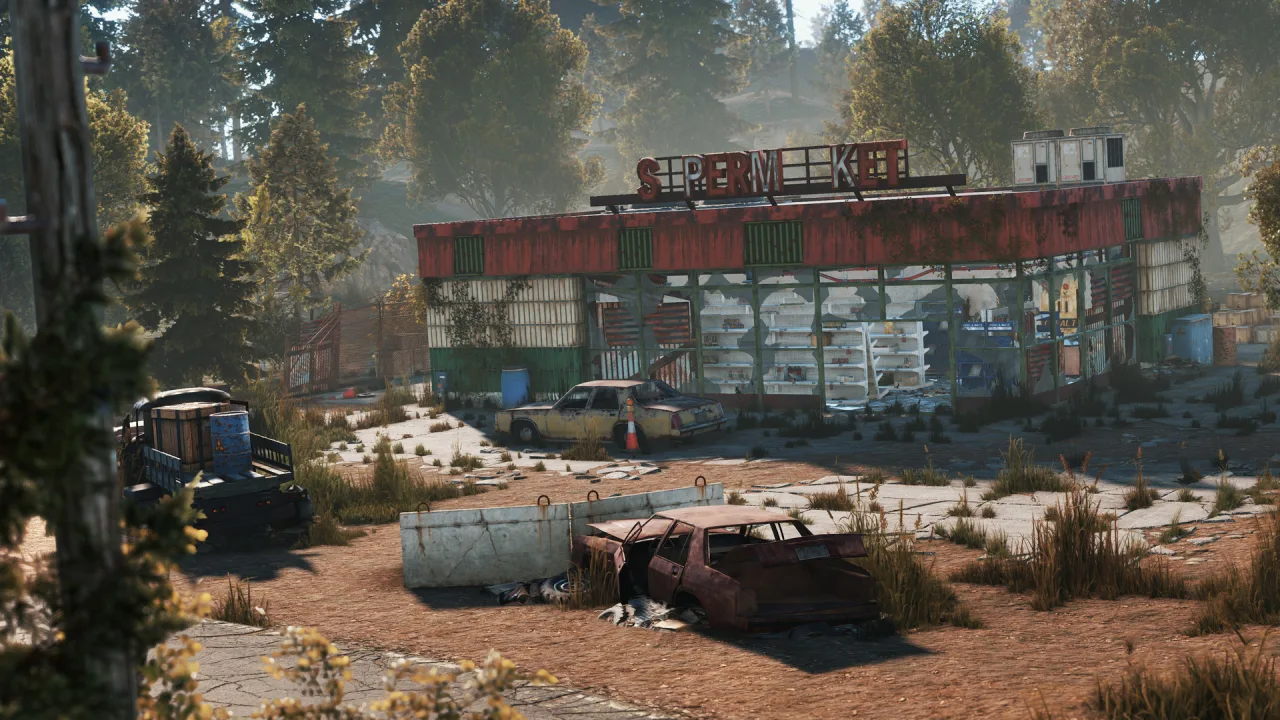 An abandoned roadside supermarket with a red roof, wrecked cars and surrounding trees in Rust.